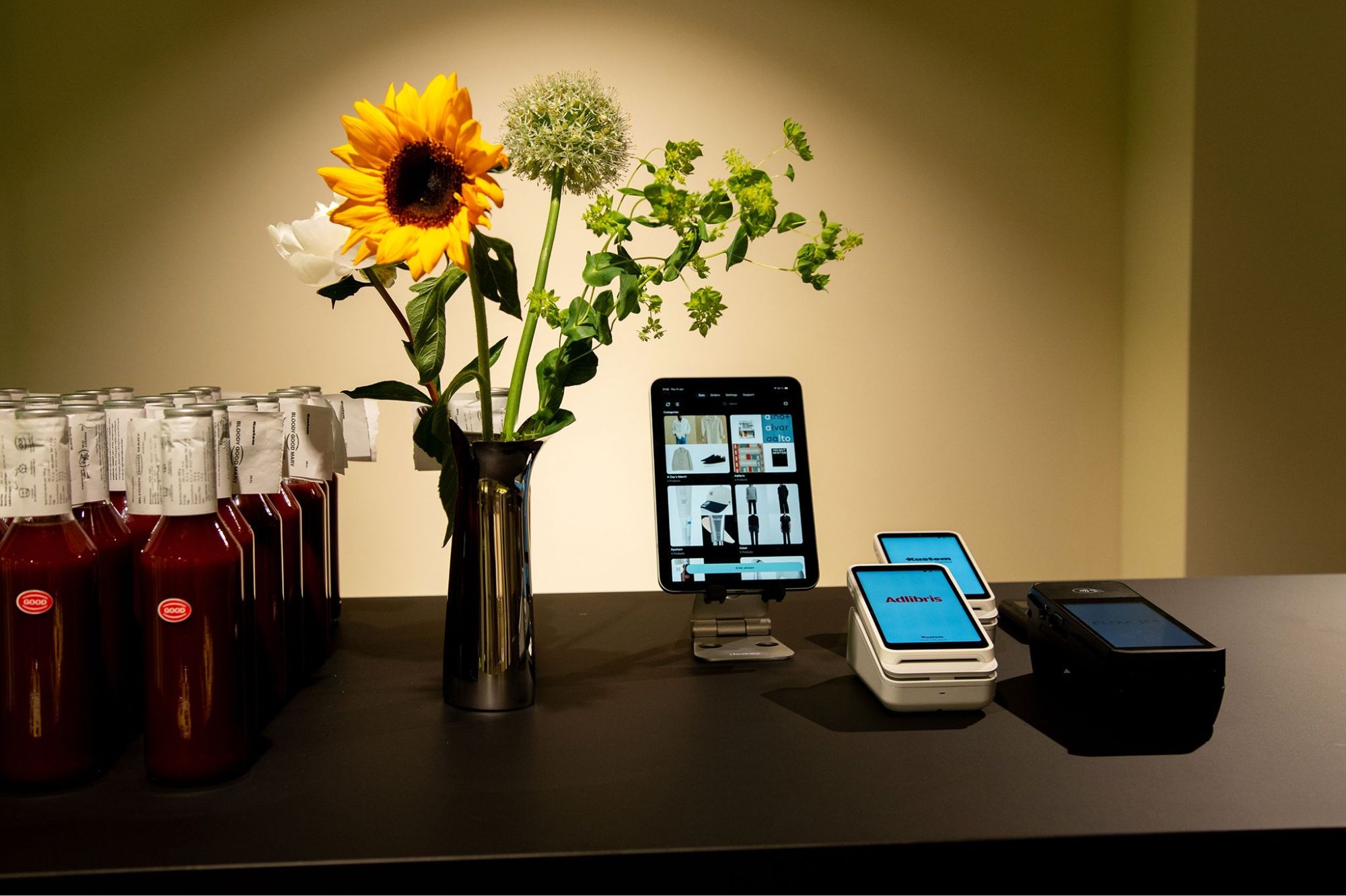 The point of sale on an iPad, beside two terminals